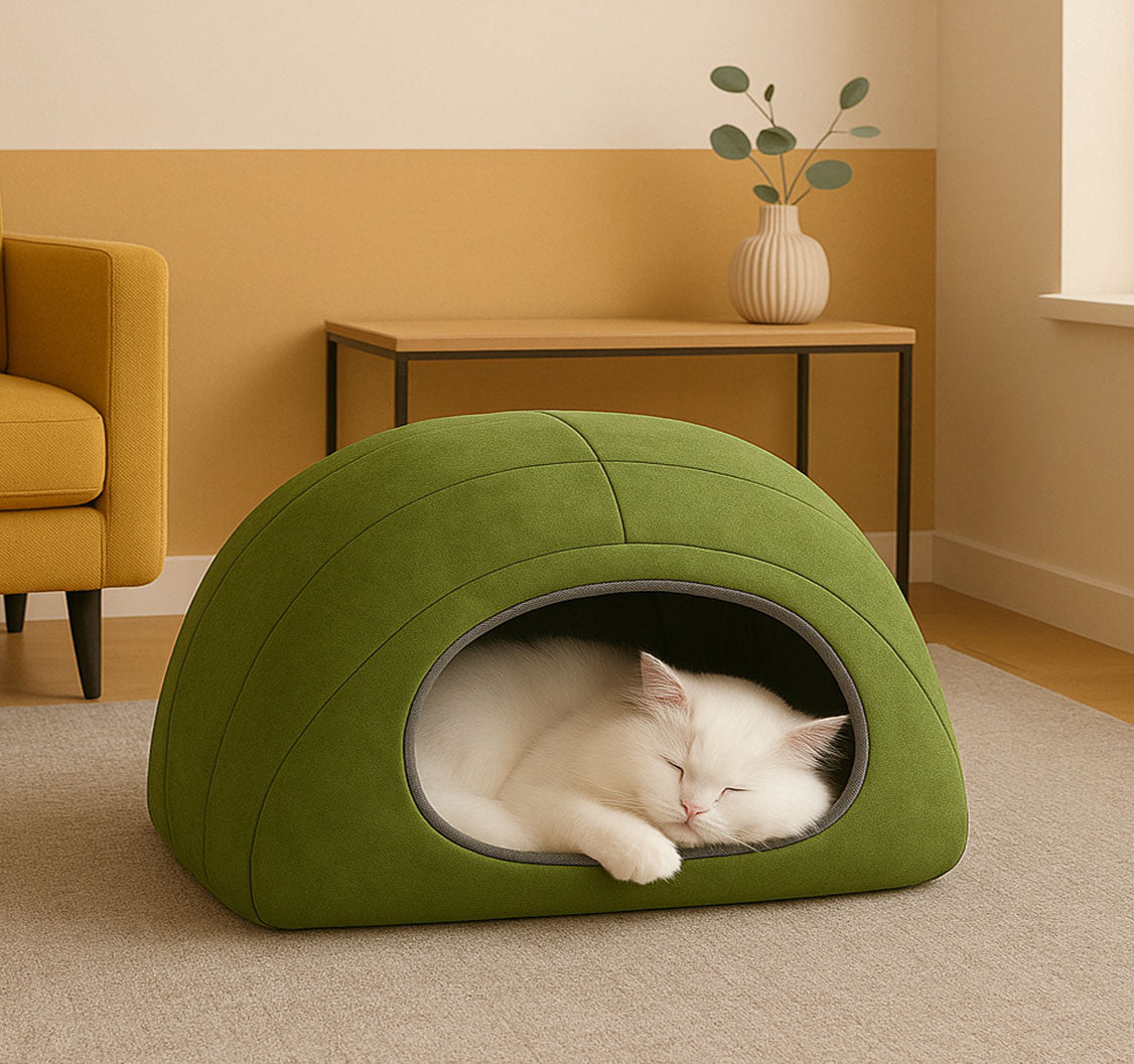 Ragdoll cat sleeping inside a soft green velvet dome-shaped cat nest – cozy premium bed by Aristopet
